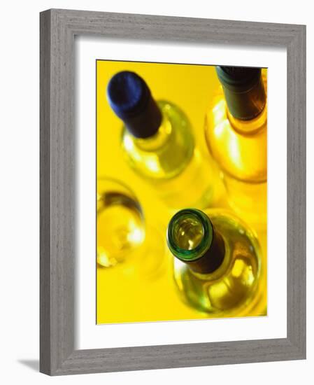 Three White Wine Bottles and a Wine Glass-Ulrike Koeb-Framed Photographic Print