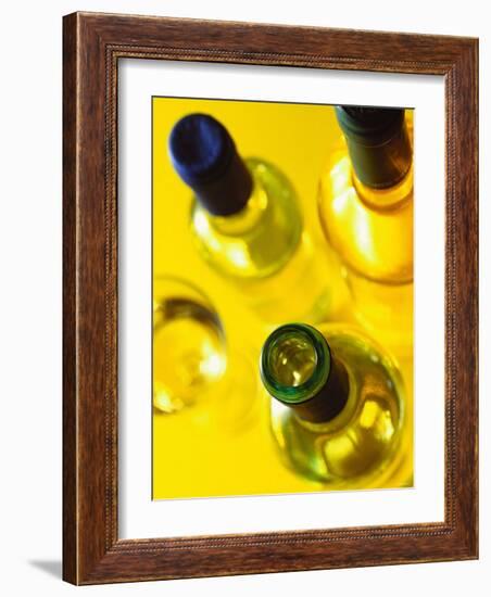 Three White Wine Bottles and a Wine Glass-Ulrike Koeb-Framed Photographic Print