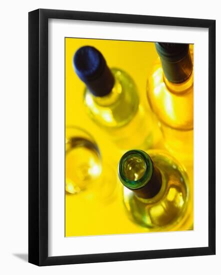 Three White Wine Bottles and a Wine Glass-Ulrike Koeb-Framed Photographic Print