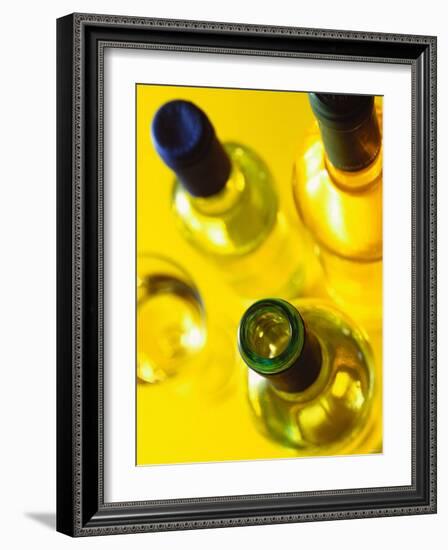 Three White Wine Bottles and a Wine Glass-Ulrike Koeb-Framed Photographic Print