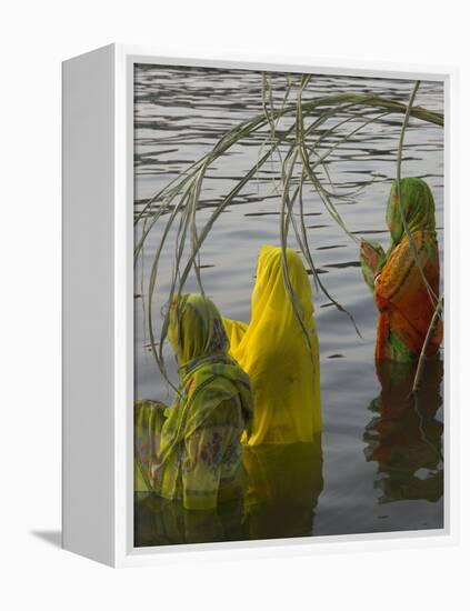 Three Women Pilgrims in Saris Making Puja Celebration in the Pichola Lake at Sunset, Udaipur, India-Eitan Simanor-Framed Premier Image Canvas