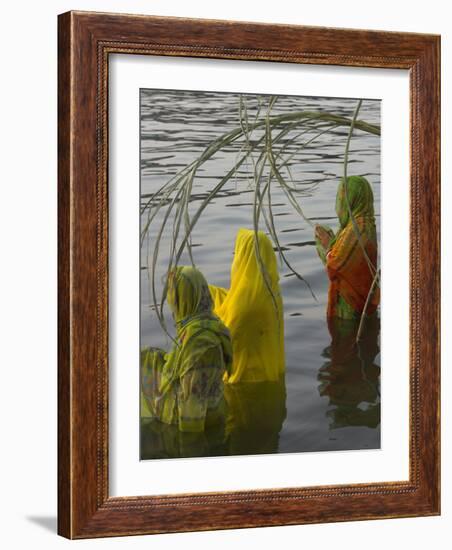 Three Women Pilgrims in Saris Making Puja Celebration in the Pichola Lake at Sunset, Udaipur, India-Eitan Simanor-Framed Photographic Print