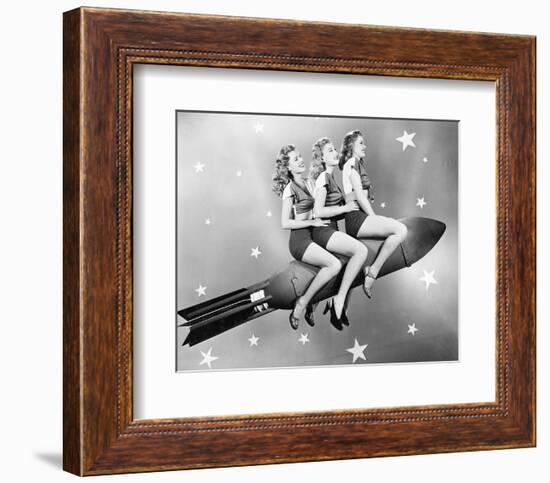 Three Women Sitting on Rocket-null-Framed Art Print