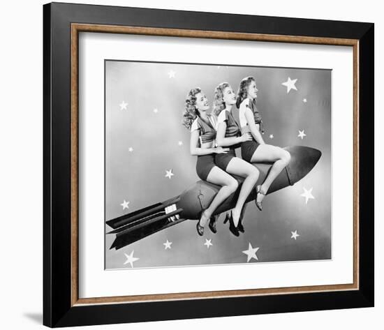 Three Women Sitting on Rocket-null-Framed Art Print