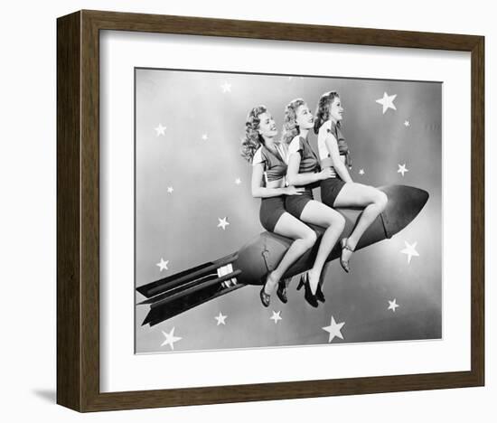 Three Women Sitting on Rocket-null-Framed Art Print