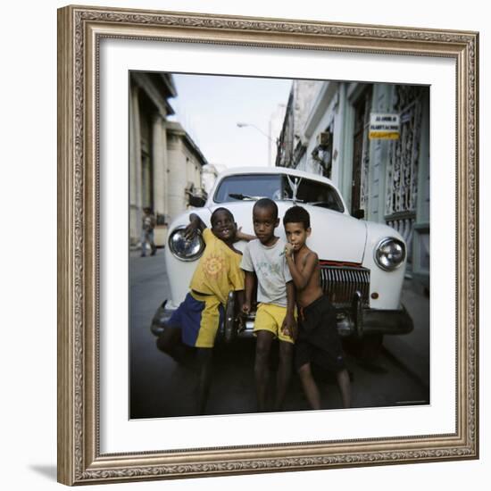 Three Young Boys Posing Against Old White American Car, Havana, Cuba, West Indies, Central America-Lee Frost-Framed Photographic Print