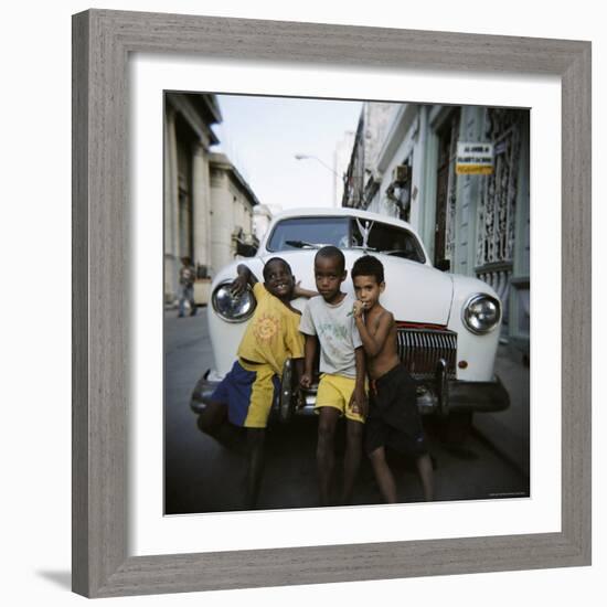 Three Young Boys Posing Against Old White American Car, Havana, Cuba, West Indies, Central America-Lee Frost-Framed Photographic Print