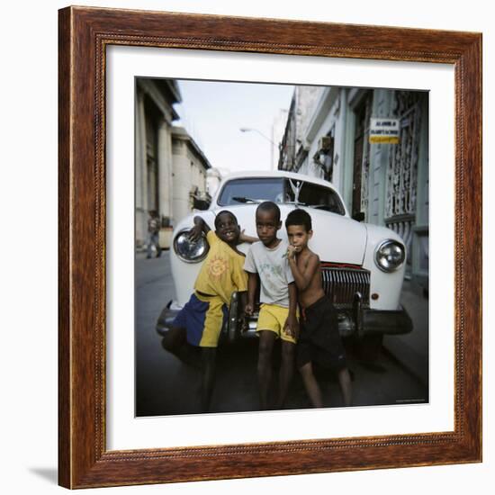 Three Young Boys Posing Against Old White American Car, Havana, Cuba, West Indies, Central America-Lee Frost-Framed Photographic Print