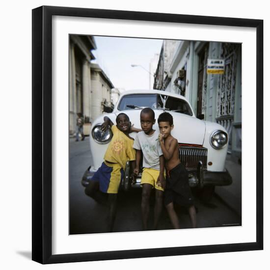 Three Young Boys Posing Against Old White American Car, Havana, Cuba, West Indies, Central America-Lee Frost-Framed Photographic Print