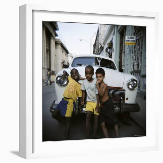 Three Young Boys Posing Against Old White American Car, Havana, Cuba, West Indies, Central America-Lee Frost-Framed Photographic Print