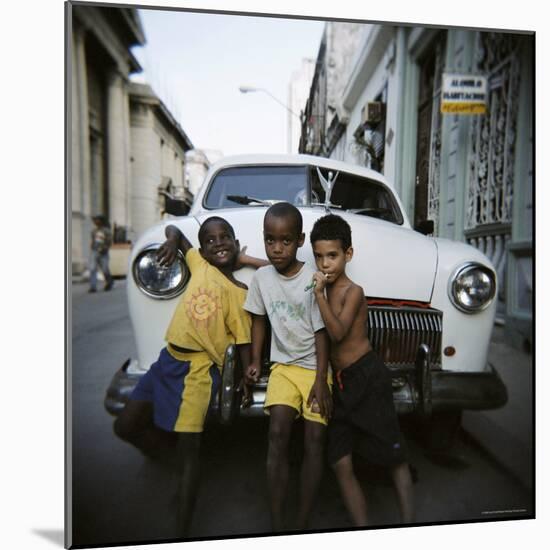 Three Young Boys Posing Against Old White American Car, Havana, Cuba, West Indies, Central America-Lee Frost-Mounted Photographic Print