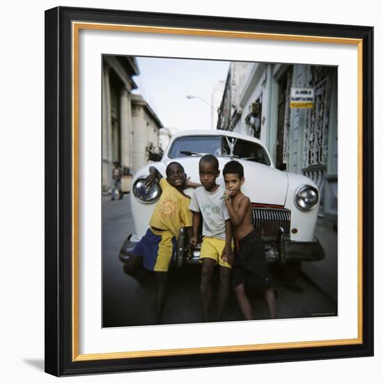 Three Young Boys Posing Against Old White American Car, Havana, Cuba, West Indies, Central America-Lee Frost-Framed Photographic Print