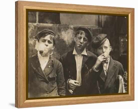 Three Young Newsboys Smoking, Saint Louis, Missouri, USA, circa 1910-Lewis Wickes Hine-Framed Premier Image Canvas