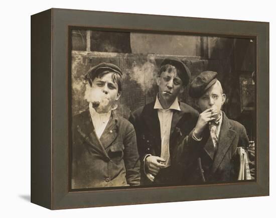 Three Young Newsboys Smoking, Saint Louis, Missouri, USA, circa 1910-Lewis Wickes Hine-Framed Premier Image Canvas