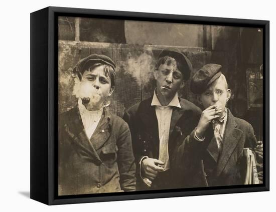 Three Young Newsboys Smoking, Saint Louis, Missouri, USA, circa 1910-Lewis Wickes Hine-Framed Premier Image Canvas