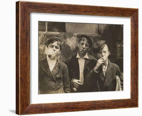 Three Young Newsboys Smoking, Saint Louis, Missouri, USA, circa 1910-Lewis Wickes Hine-Framed Photographic Print