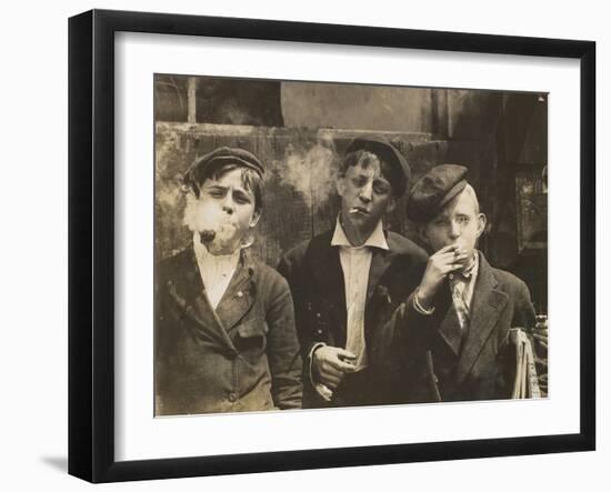 Three Young Newsboys Smoking, Saint Louis, Missouri, USA, circa 1910-Lewis Wickes Hine-Framed Photographic Print