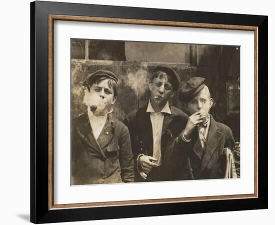 Three Young Newsboys Smoking, Saint Louis, Missouri, USA, circa 1910-Lewis Wickes Hine-Framed Photographic Print