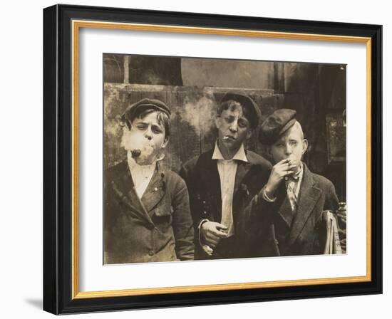 Three Young Newsboys Smoking, Saint Louis, Missouri, USA, circa 1910-Lewis Wickes Hine-Framed Photographic Print
