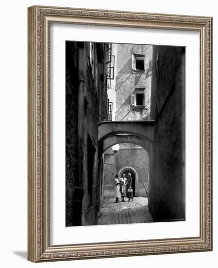 Three Young Women Chatting in Cobbled Alleyway of Old Section of Salzburg-Alfred Eisenstaedt-Framed Photographic Print
