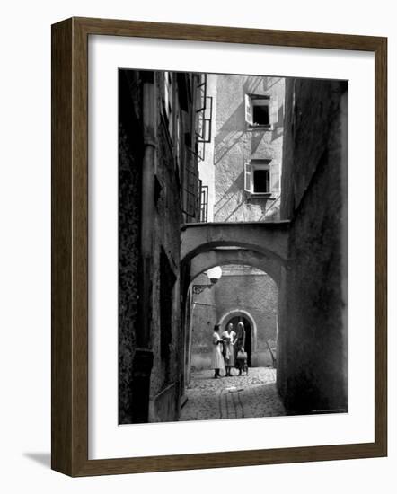 Three Young Women Chatting in Cobbled Alleyway of Old Section of Salzburg-Alfred Eisenstaedt-Framed Photographic Print