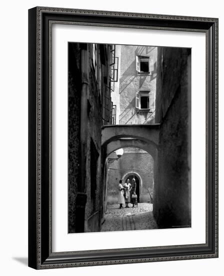 Three Young Women Chatting in Cobbled Alleyway of Old Section of Salzburg-Alfred Eisenstaedt-Framed Photographic Print