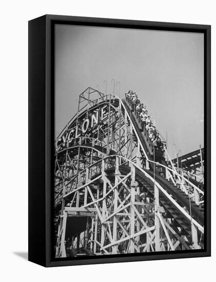 Thrill Seekers at the Top of the Cyclone Roller Coaster at Coney Island Amusement Park-Marie Hansen-Framed Premier Image Canvas