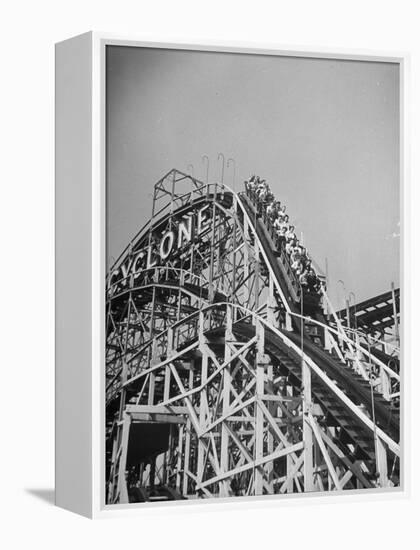 Thrill Seekers at the Top of the Cyclone Roller Coaster at Coney Island Amusement Park-Marie Hansen-Framed Premier Image Canvas