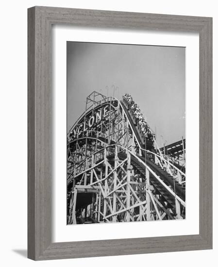 Thrill Seekers at the Top of the Cyclone Roller Coaster at Coney Island Amusement Park-Marie Hansen-Framed Photographic Print