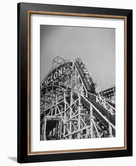 Thrill Seekers at the Top of the Cyclone Roller Coaster at Coney Island Amusement Park-Marie Hansen-Framed Photographic Print