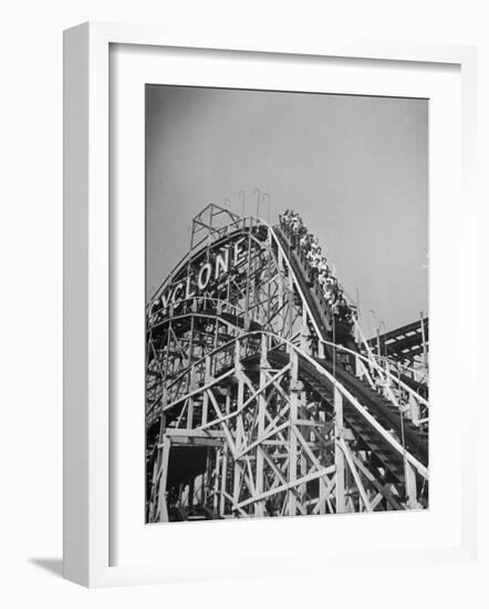 Thrill Seekers at the Top of the Cyclone Roller Coaster at Coney Island Amusement Park-Marie Hansen-Framed Photographic Print