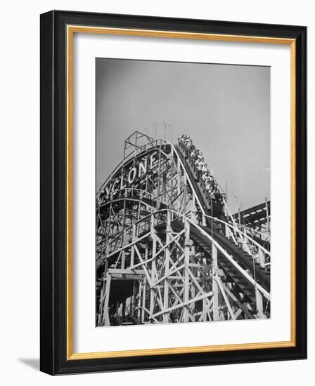 Thrill Seekers at the Top of the Cyclone Roller Coaster at Coney Island Amusement Park-Marie Hansen-Framed Photographic Print