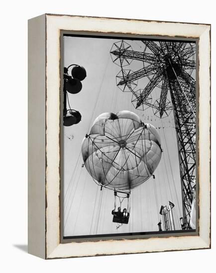 Thrillseeking Couple Take a Ride on the 300-Ft. Parachute Jump at Coney Island Amusement Park-null-Framed Premier Image Canvas