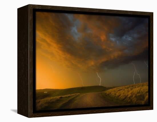 Thunderstorm and Orange Clouds at Sunset-Jonathan Hicks-Framed Premier Image Canvas