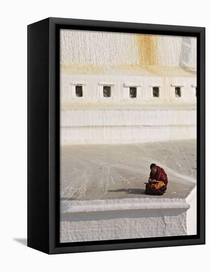 Tibetan Buddhist Monk Reading Scriptures at the Boudha Stupa at Bodhanath, Kathmandu, Nepal-Don Smith-Framed Premier Image Canvas