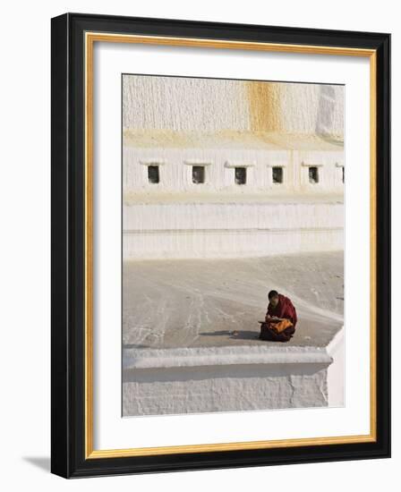 Tibetan Buddhist Monk Reading Scriptures at the Boudha Stupa at Bodhanath, Kathmandu, Nepal-Don Smith-Framed Photographic Print