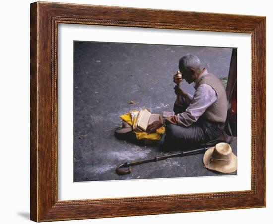 Tibetan Buddhist Pilgrim Reading Texts and Holding Prayer Wheel, Lhasa, China-Alison Wright-Framed Photographic Print