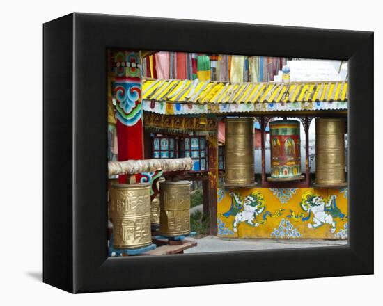 Tibetan Buddhist Prayer Wheels at Shuzheng Village, Sichuan Province, China-Charles Crust-Framed Premier Image Canvas