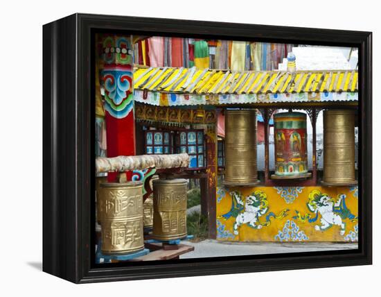 Tibetan Buddhist Prayer Wheels at Shuzheng Village, Sichuan Province, China-Charles Crust-Framed Premier Image Canvas