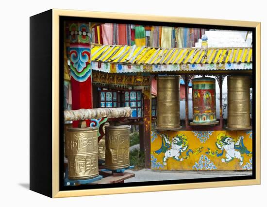 Tibetan Buddhist Prayer Wheels at Shuzheng Village, Sichuan Province, China-Charles Crust-Framed Premier Image Canvas