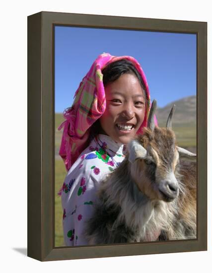 Tibetan Girl Holding Sheep in the Meadow, East Himalayas, Tibet, China-Keren Su-Framed Premier Image Canvas