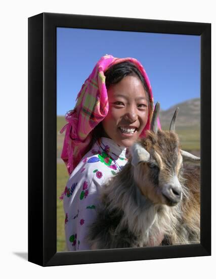 Tibetan Girl Holding Sheep in the Meadow, East Himalayas, Tibet, China-Keren Su-Framed Premier Image Canvas