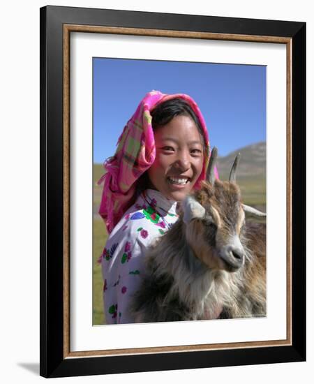 Tibetan Girl Holding Sheep in the Meadow, East Himalayas, Tibet, China-Keren Su-Framed Photographic Print