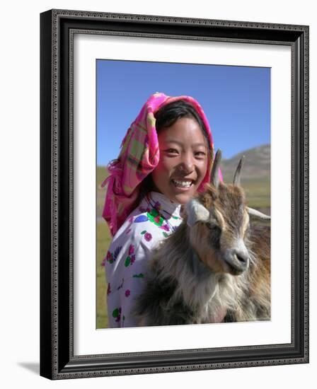 Tibetan Girl Holding Sheep in the Meadow, East Himalayas, Tibet, China-Keren Su-Framed Photographic Print