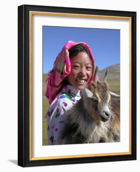 Tibetan Girl Holding Sheep in the Meadow, East Himalayas, Tibet, China-Keren Su-Framed Photographic Print