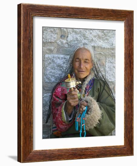 Tibetan Woman Holding Praying Wheel in Sakya Monastery, Tibet, China-Keren Su-Framed Photographic Print