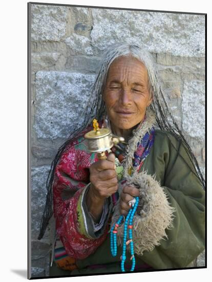 Tibetan Woman Holding Praying Wheel in Sakya Monastery, Tibet, China-Keren Su-Mounted Photographic Print