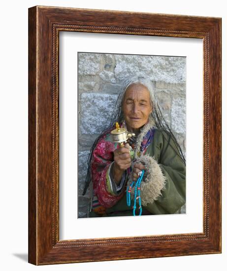 Tibetan Woman Holding Praying Wheel in Sakya Monastery, Tibet, China-Keren Su-Framed Photographic Print