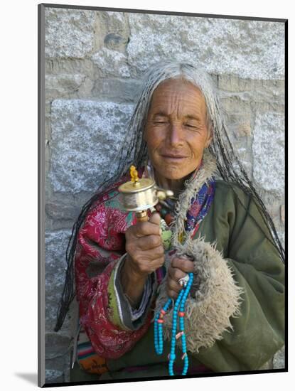 Tibetan Woman Holding Praying Wheel in Sakya Monastery, Tibet, China-Keren Su-Mounted Photographic Print