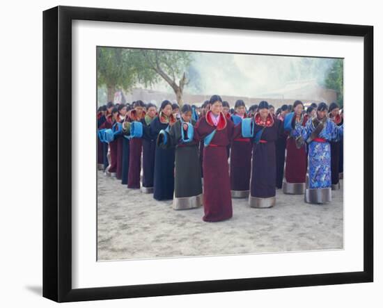 Tibetan Women Pray at Harvest Festival, Tongren Area, Qinghai Province, China-Gina Corrigan-Framed Photographic Print
